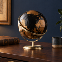 Globe terrestre 3D noir et bronze — mise en situation